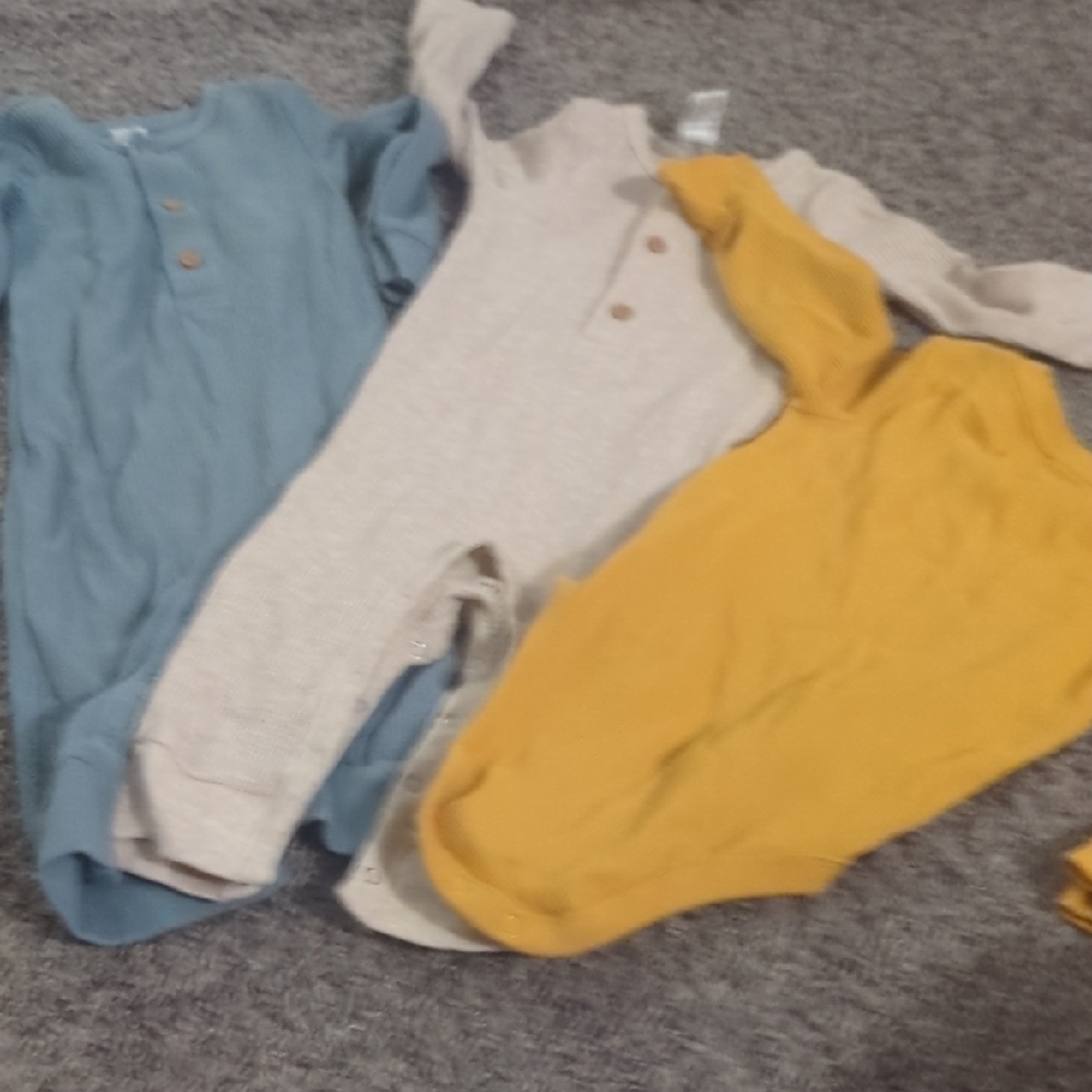 Set of Three Baby Rompers in Blue, Cream, and Yellow